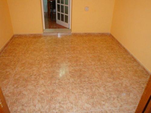 BONITO PISO EN PLANTA BAJA 3 DORMITORIOS CONVERTIDOS EN 2