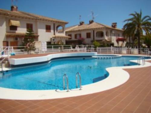 ORIHUELA-COSTA,BUNGALOW PLANTA BAJA 2 HABS,PISCINA,PARKING,CERCA PLAYA,VISTAS AL MAR 75.000E