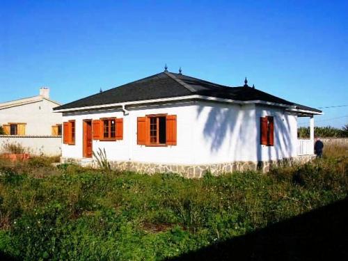 Parcela 2.000 m2, casa de madera 3 dormitorios