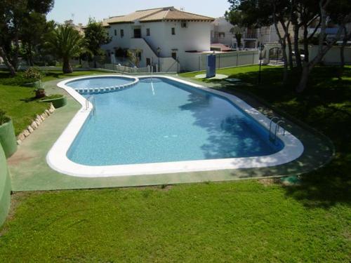 TORREVIEJA,ADOSADO  DUPLEX 1 HABS 45.000 EUROS