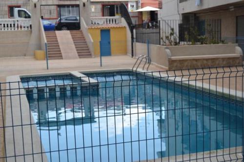 TORREVIEJA,VIVIENDA CON  ,PISCINA COM,SOLAMENTE 27.900 EUROS.